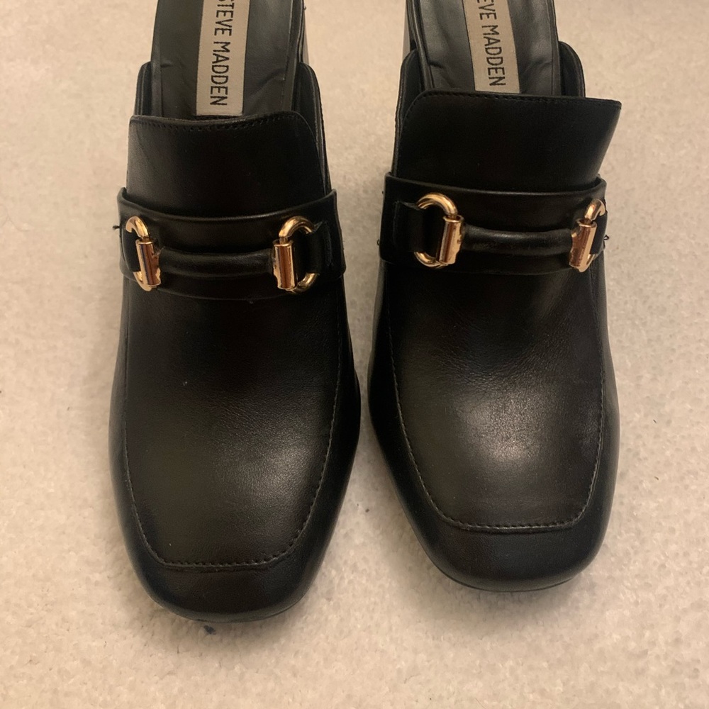 black mules with gold detail